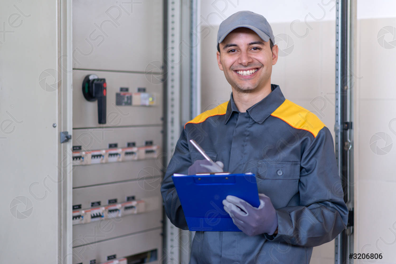 https://elite-team-llc.com/wp-content/uploads/2024/02/friendly-electrician-writing-document-3206806.jpg